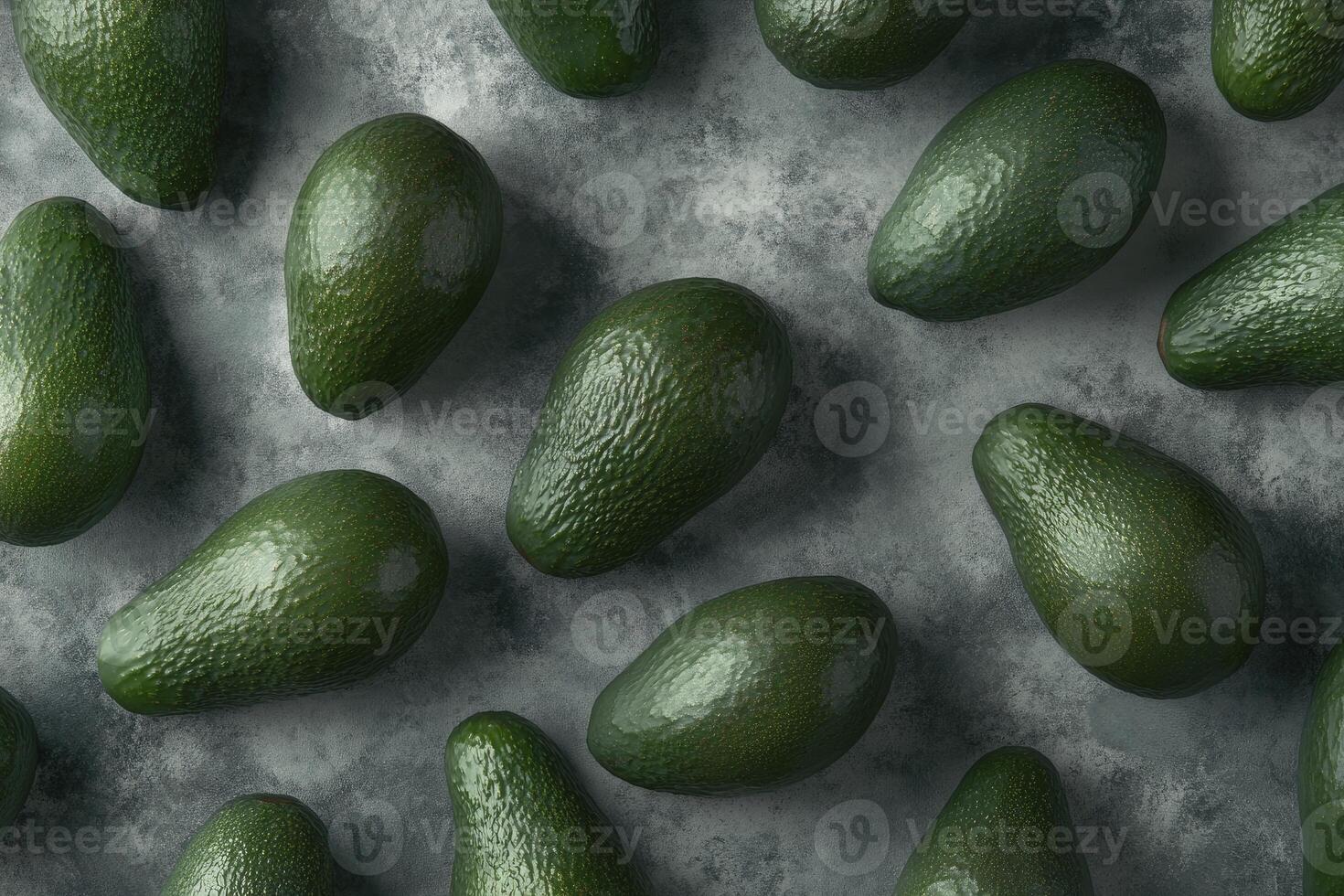 Arrangement of Whole Green Avocados on Textured Gray Background Overhead View photo