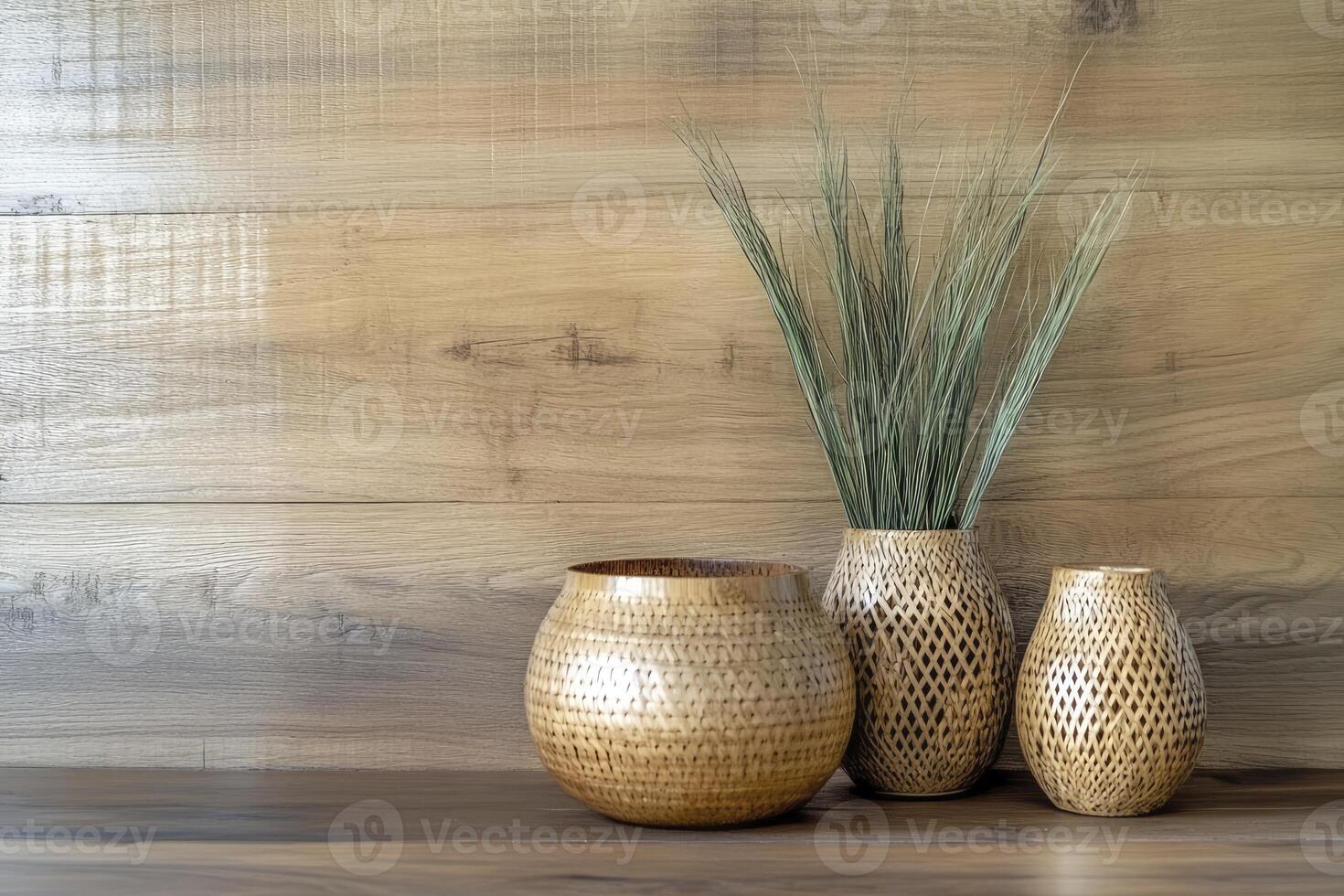 Decorative Vases and Dried Grasses on a Wooden Surface for Home Styling photo