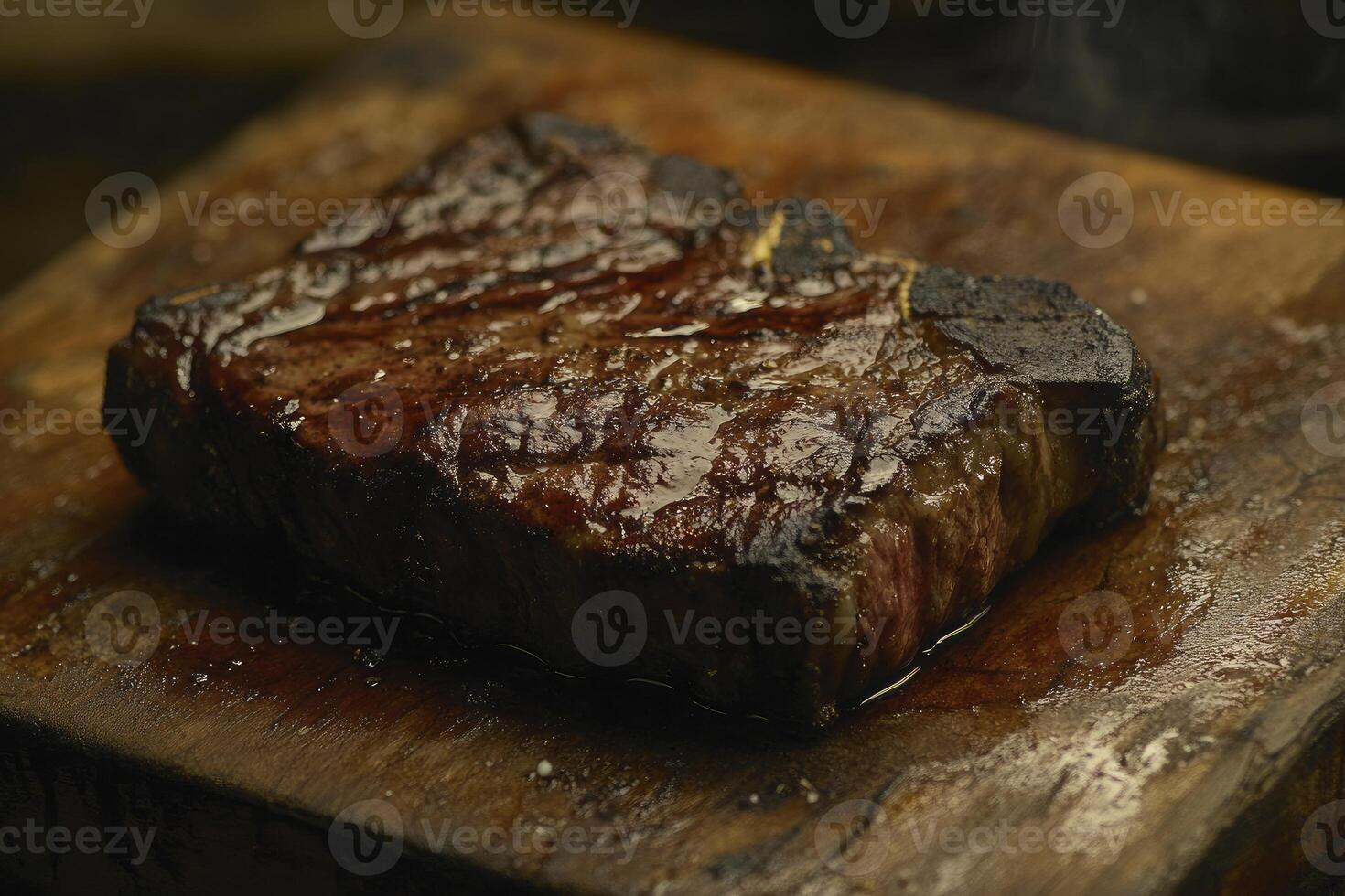 Grilled T-bone Steak on Wooden Board Ready for Delicious Meal photo