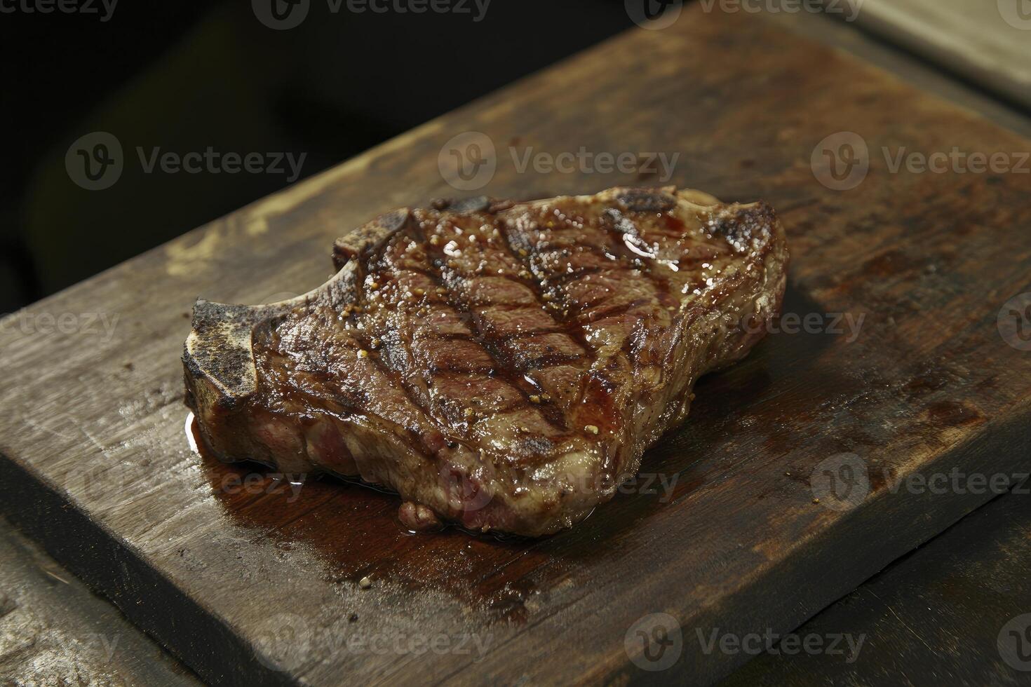 Grilled Steak on a Wooden Board Creating a Delicious Food Concept photo