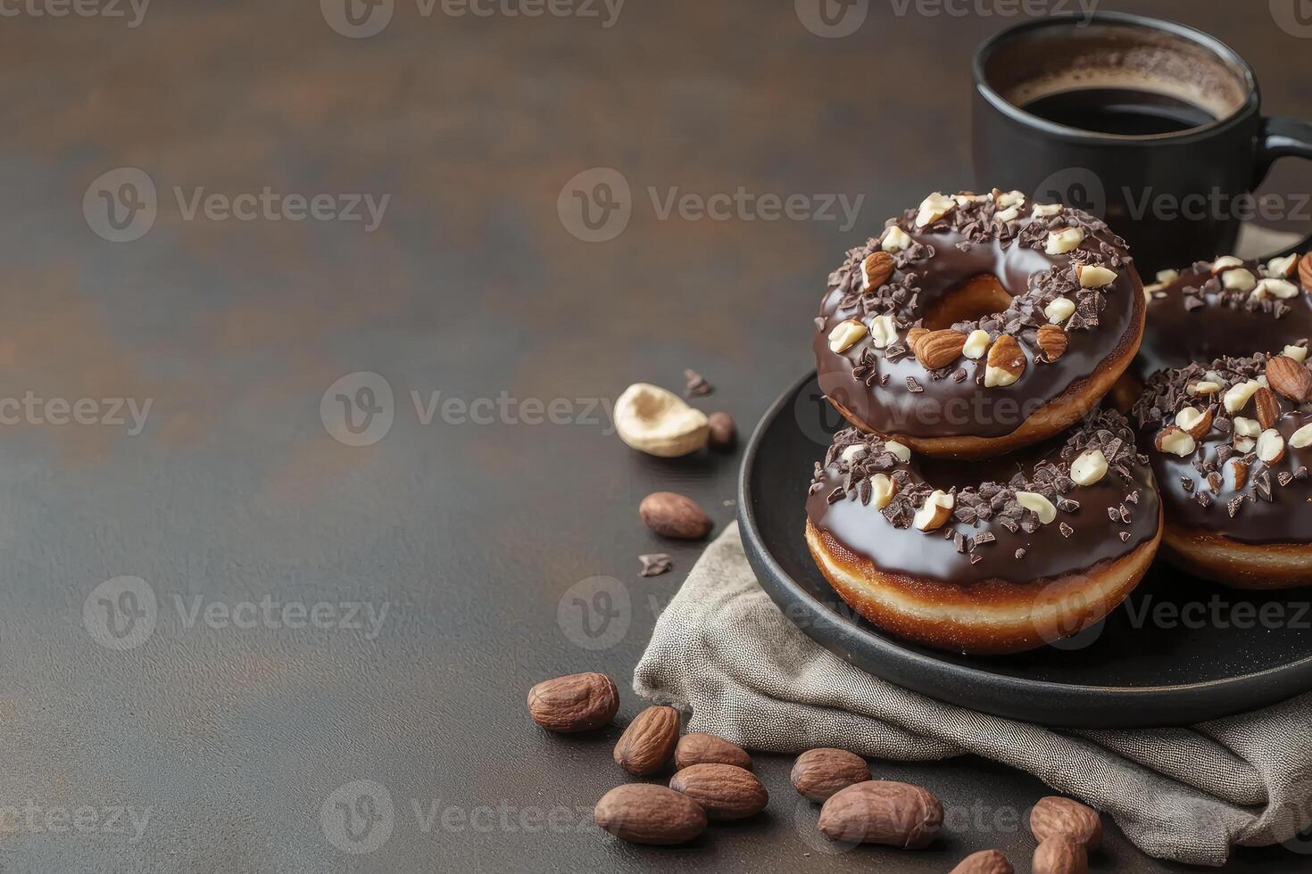 Chocolate Doughnuts with Nuts and Coffee Ready to Enjoy a Break photo