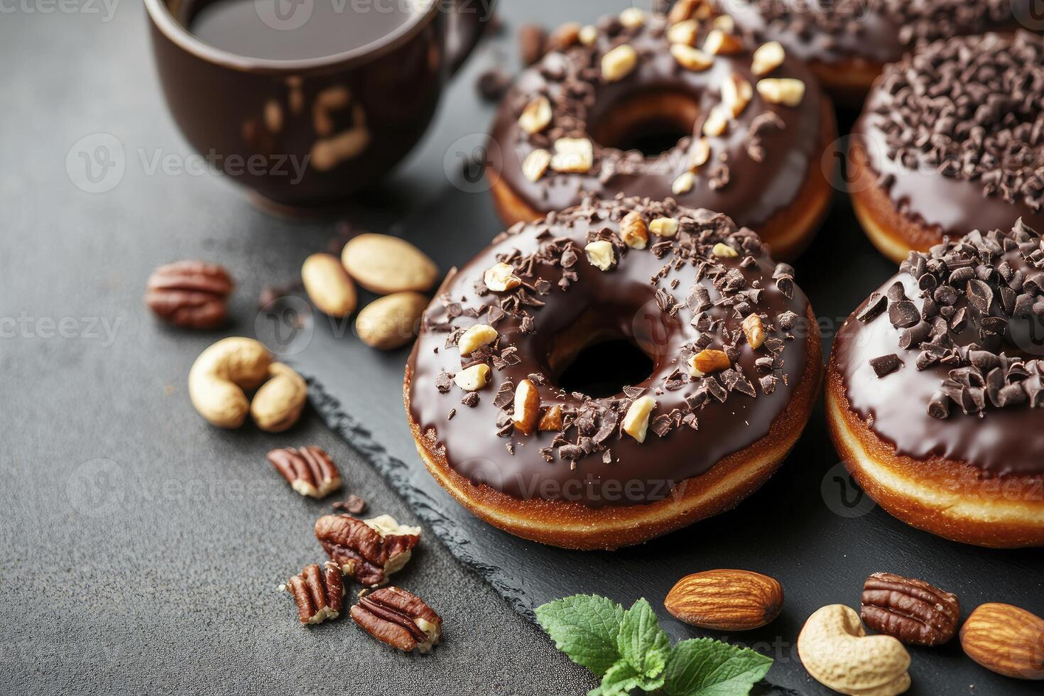 Chocolate Donuts with Nuts and Coffee Offer a Sweet Treat photo