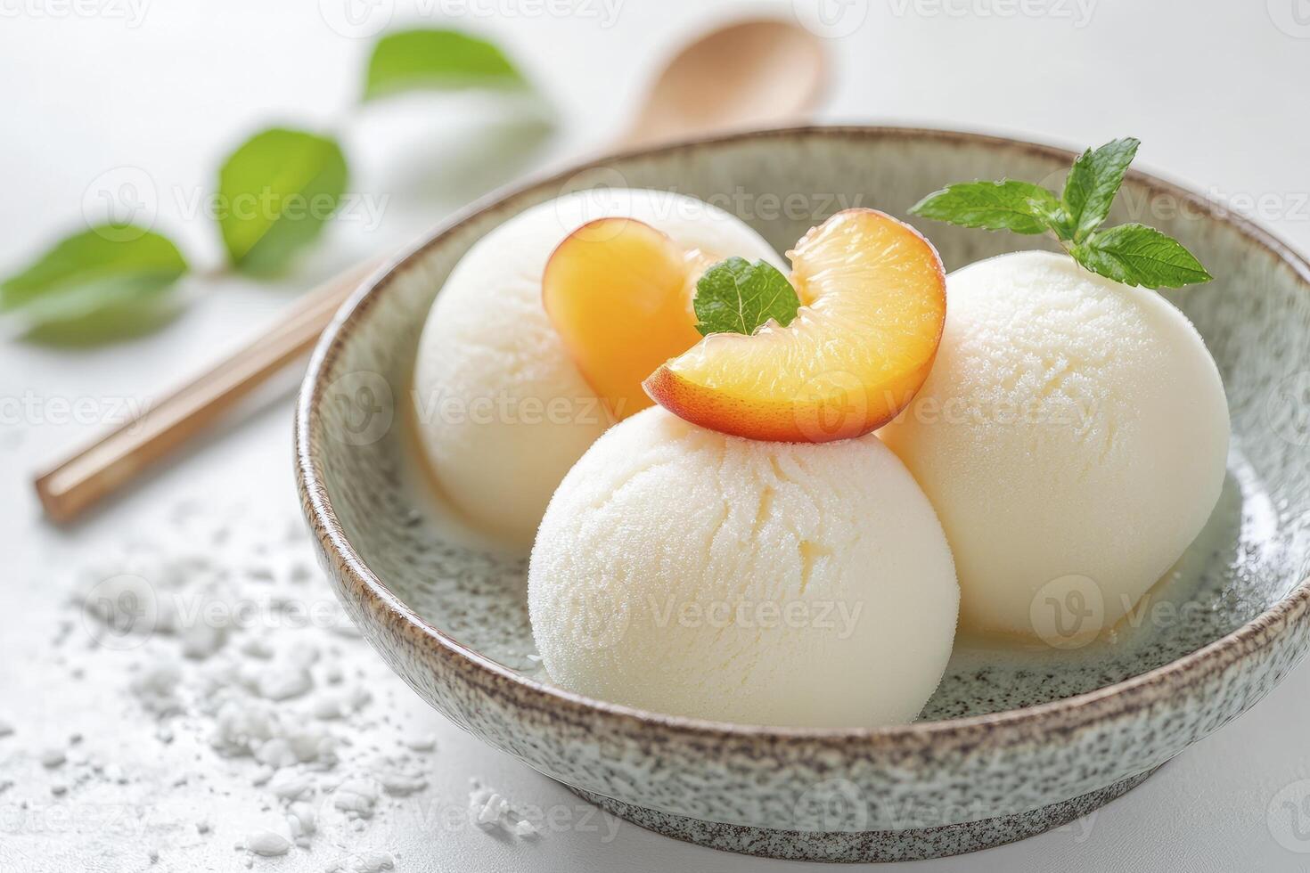 Refreshing Lemon Ice Cream with Peach and Mint in Ceramic Bowl photo