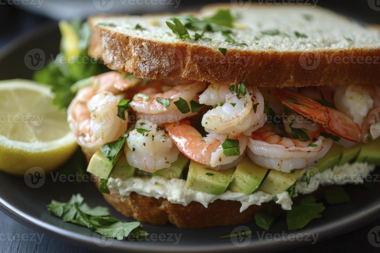 Shrimp and Avocado Sandwich with Lemon Herb Garnish Ready to Eat photo