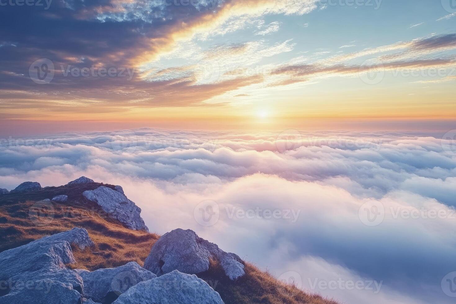 Mountain Peak Overlooking Clouds at Sunset with Beautiful Sky Scenery photo