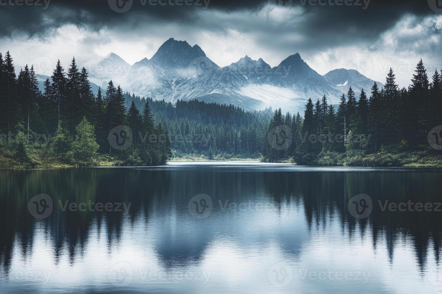 Reflective Lake Surrounded by Forest and Mountains with Overcast Sky photo