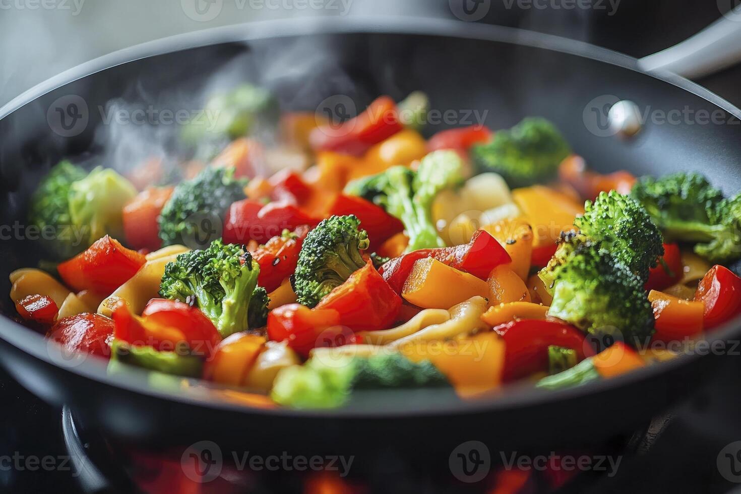 Cooking Fresh Vegetable Stir Fry with Broccoli and Peppers in Pan photo