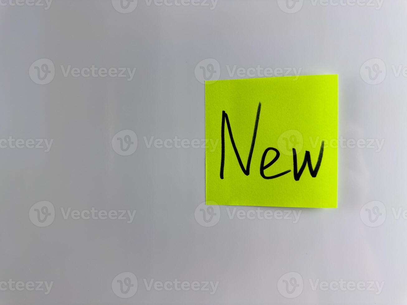Sticker on adhesive tape with one word - New photo