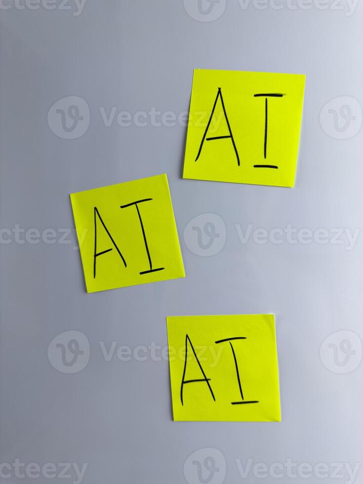 Vertical photo of three sticky notes with the inscription artificial intelligence