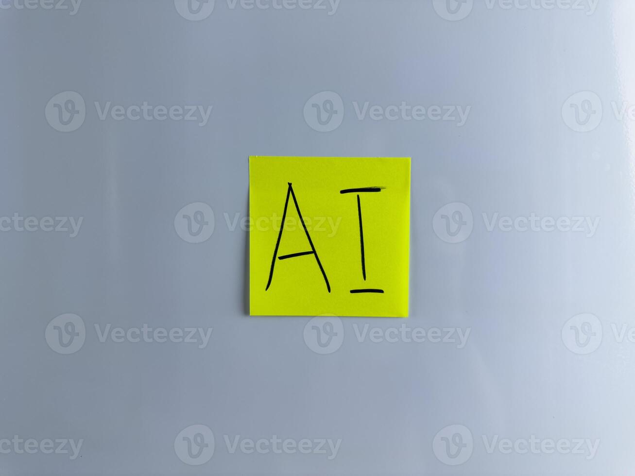 Sticker note with handwritten inscription AI on white background photo
