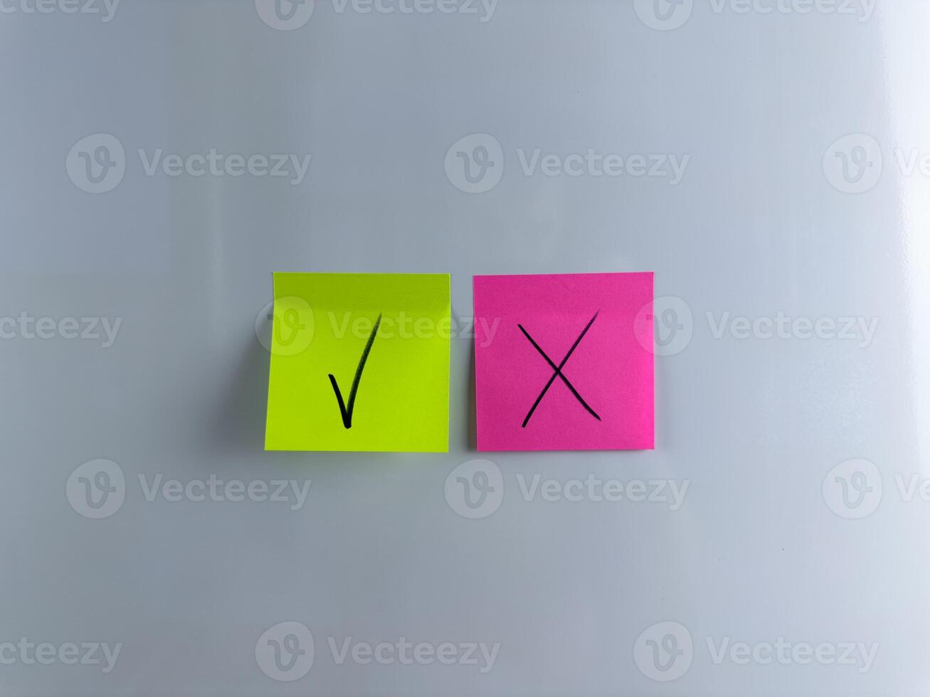 Choosing answer and marking it with tick or cross photo