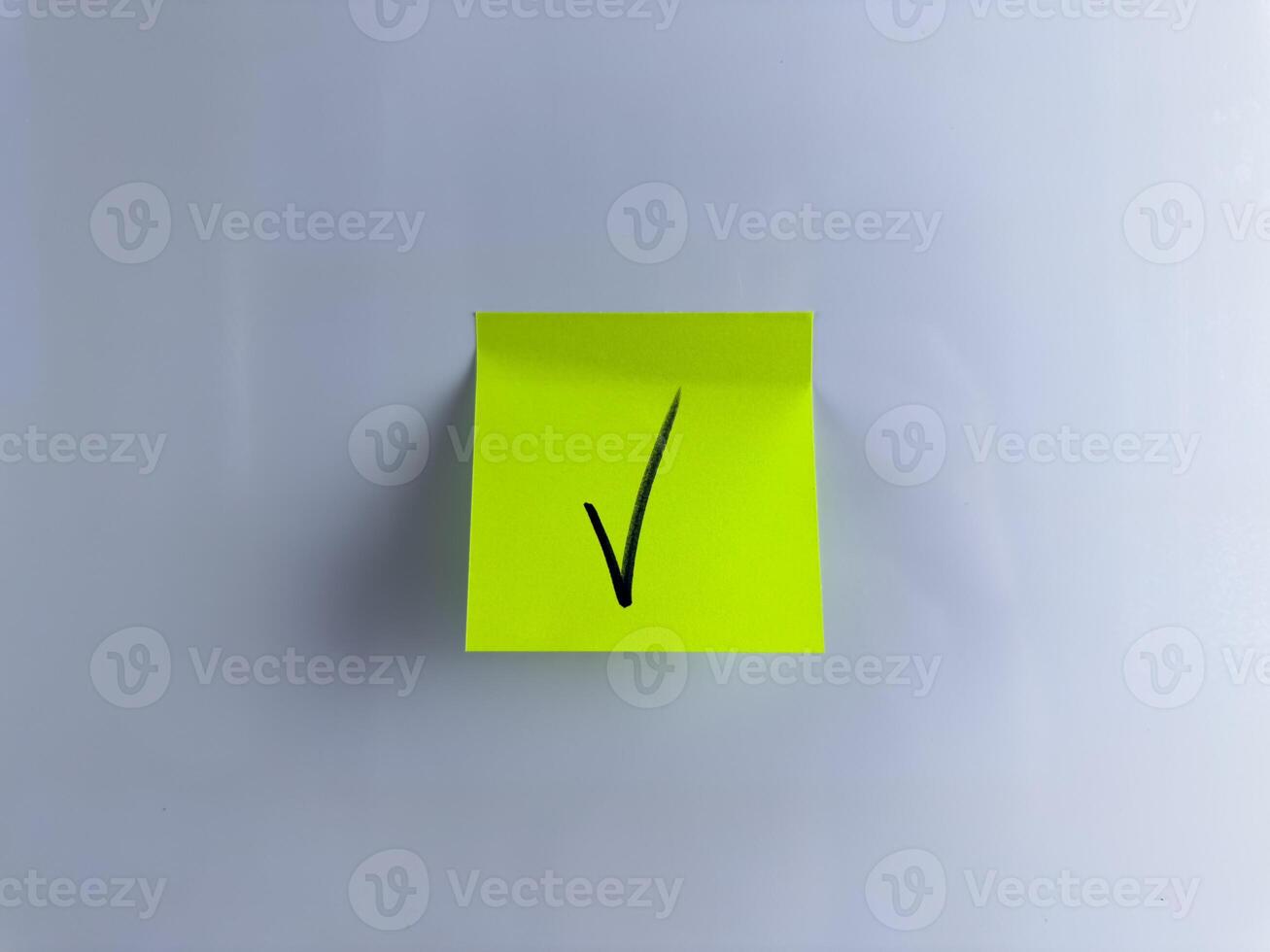 Making important decision and marking success with check mark photo