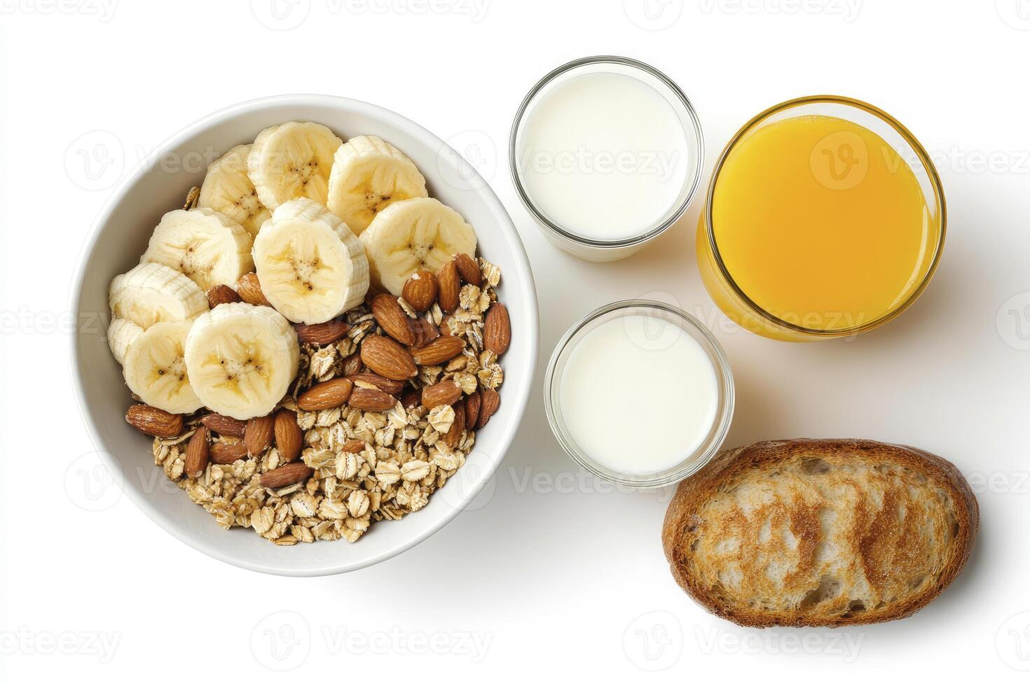 Healthy Breakfast Bowl with Banana, Almonds, Granola, Milk and Orange Juice photo