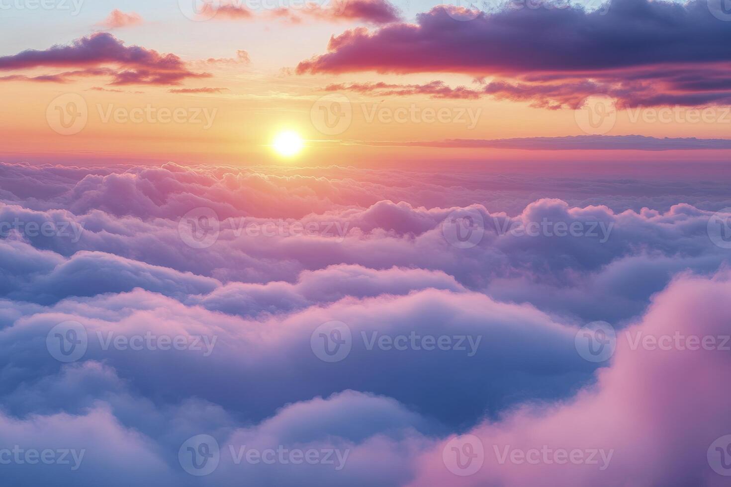 Sun Shining Over Clouds at Sunset Creating Dreamy Atmospheric Vista photo