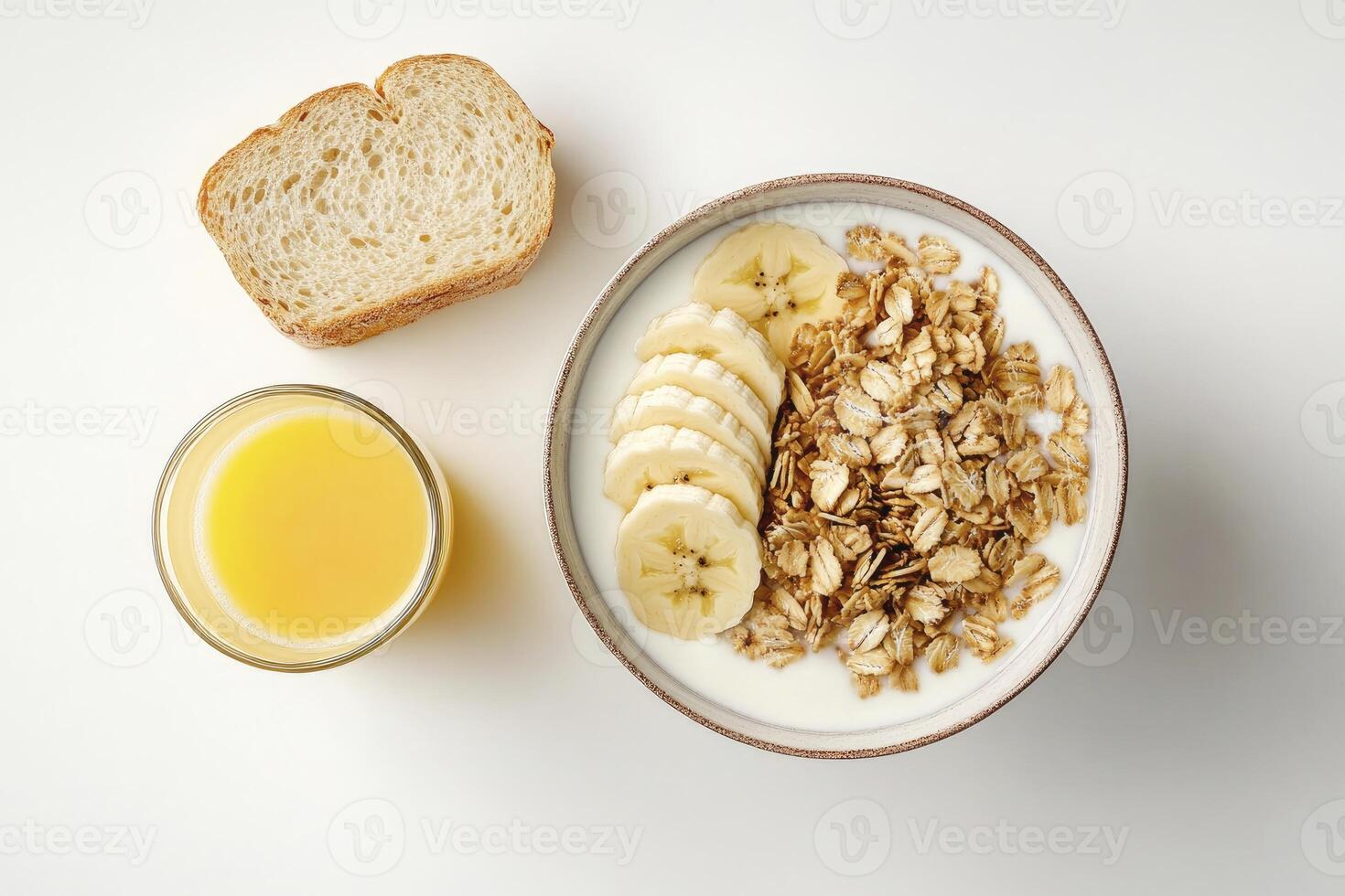 Healthy Breakfast Overhead View with Oatmeal Banana Slices Toast and Juice photo