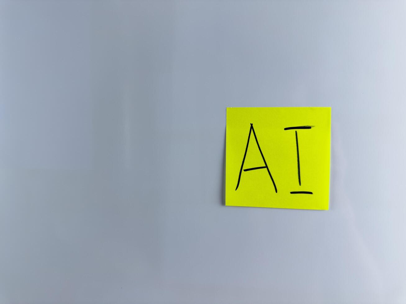 AI inscription on sticky note. Concept photo of artificial intelligence
