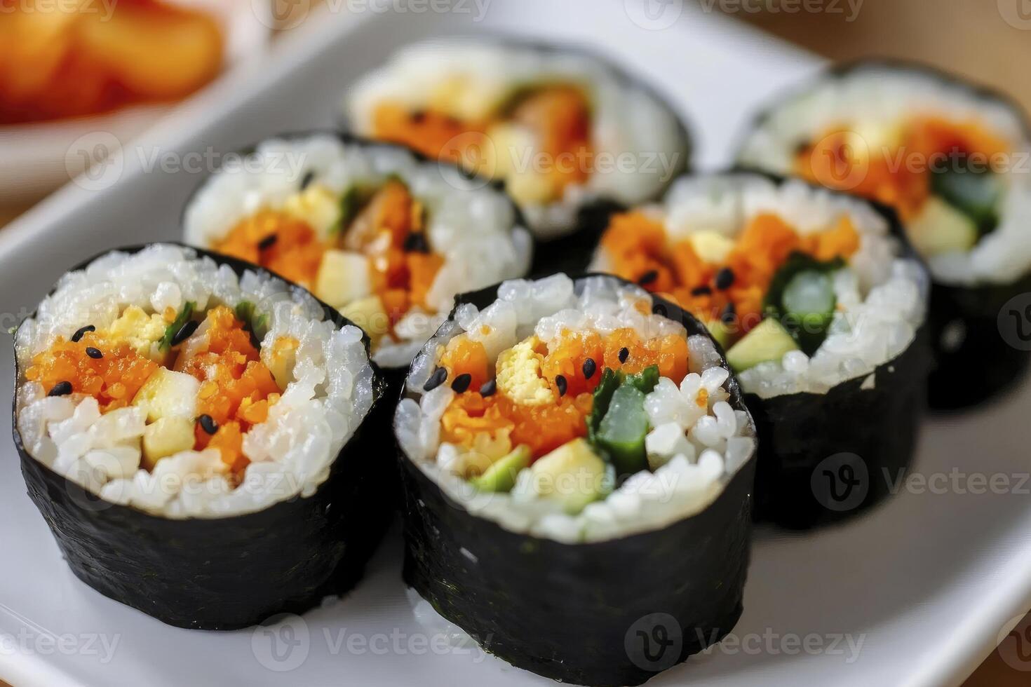 Serving of Korean Kimbap Rolls on White Plate Close Up photo