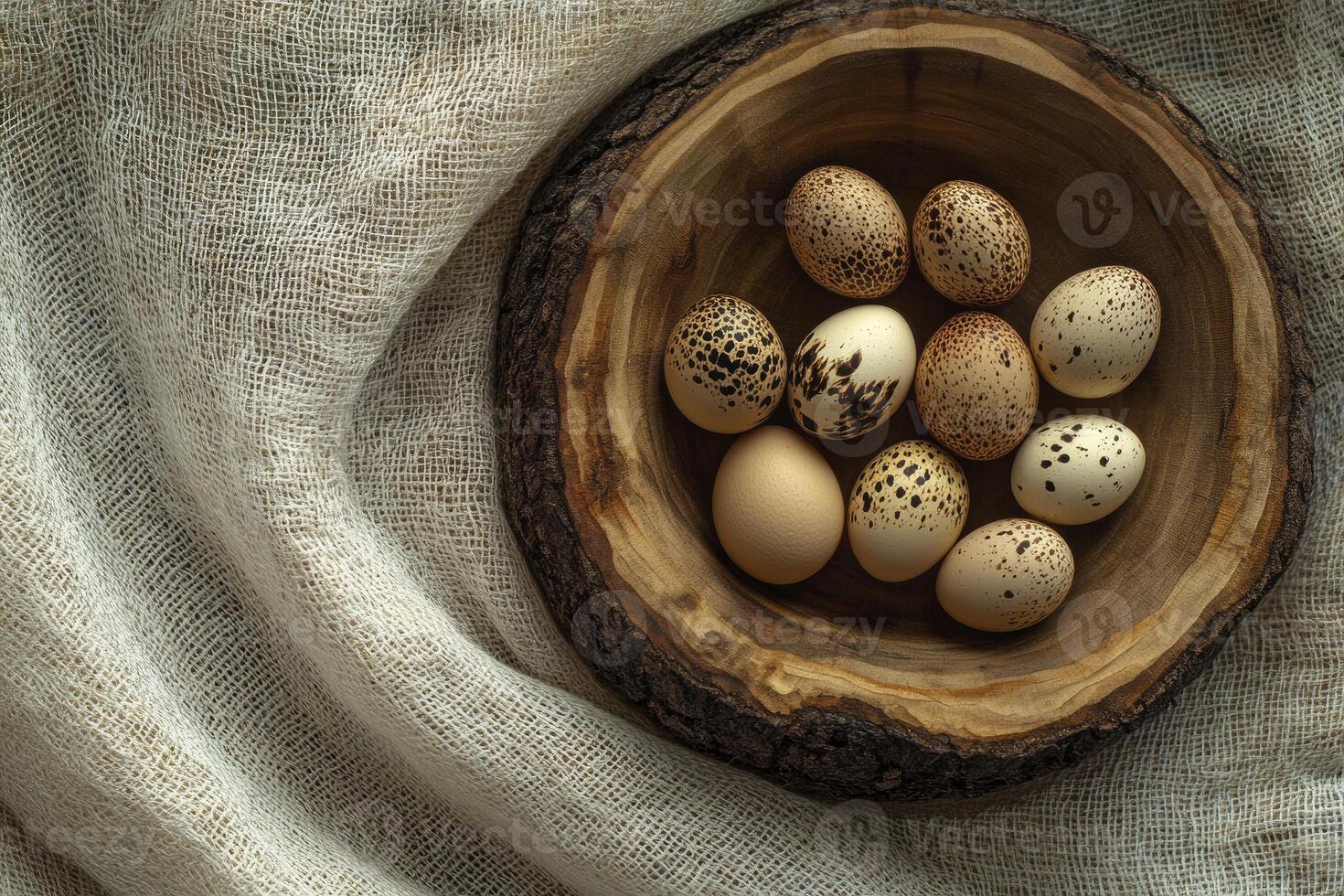 Eggs in Wooden Bowl Nestled on Textured Fabric Background Still Life photo