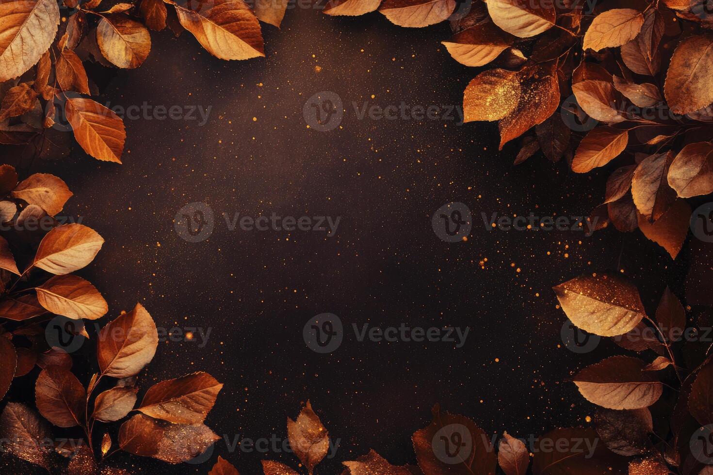 Autumn Leaves Border with Sparkling Gold Dust and Dark Background photo