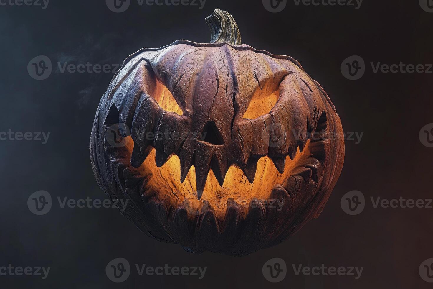 Glowing Jack O Lantern with Spooky Smile for Halloween Season photo