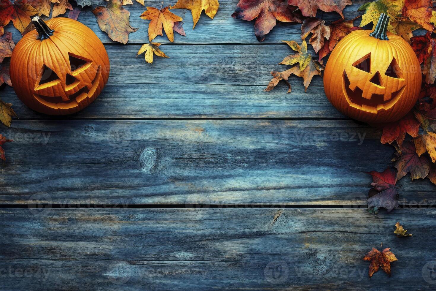 Halloween Pumpkins and Fall Leaves on Wooden Background for Spooky Season photo