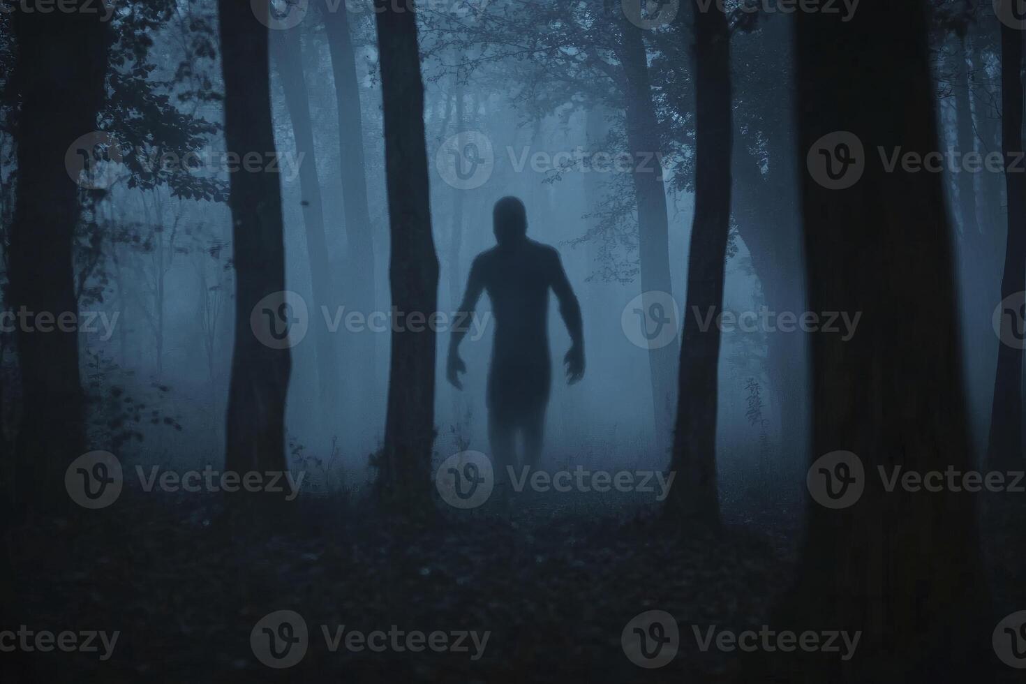 Figure Walking in Foggy Forest at Night with a Spooky Mood photo