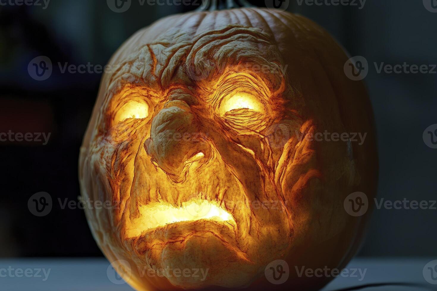 Creepy Halloween Pumpkin with Glowing Face Carved for Spooky Decoration photo