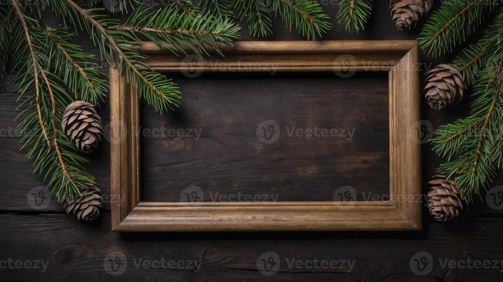 Wooden Frame with Pine Branch and Cone Decoration on Dark Wood photo