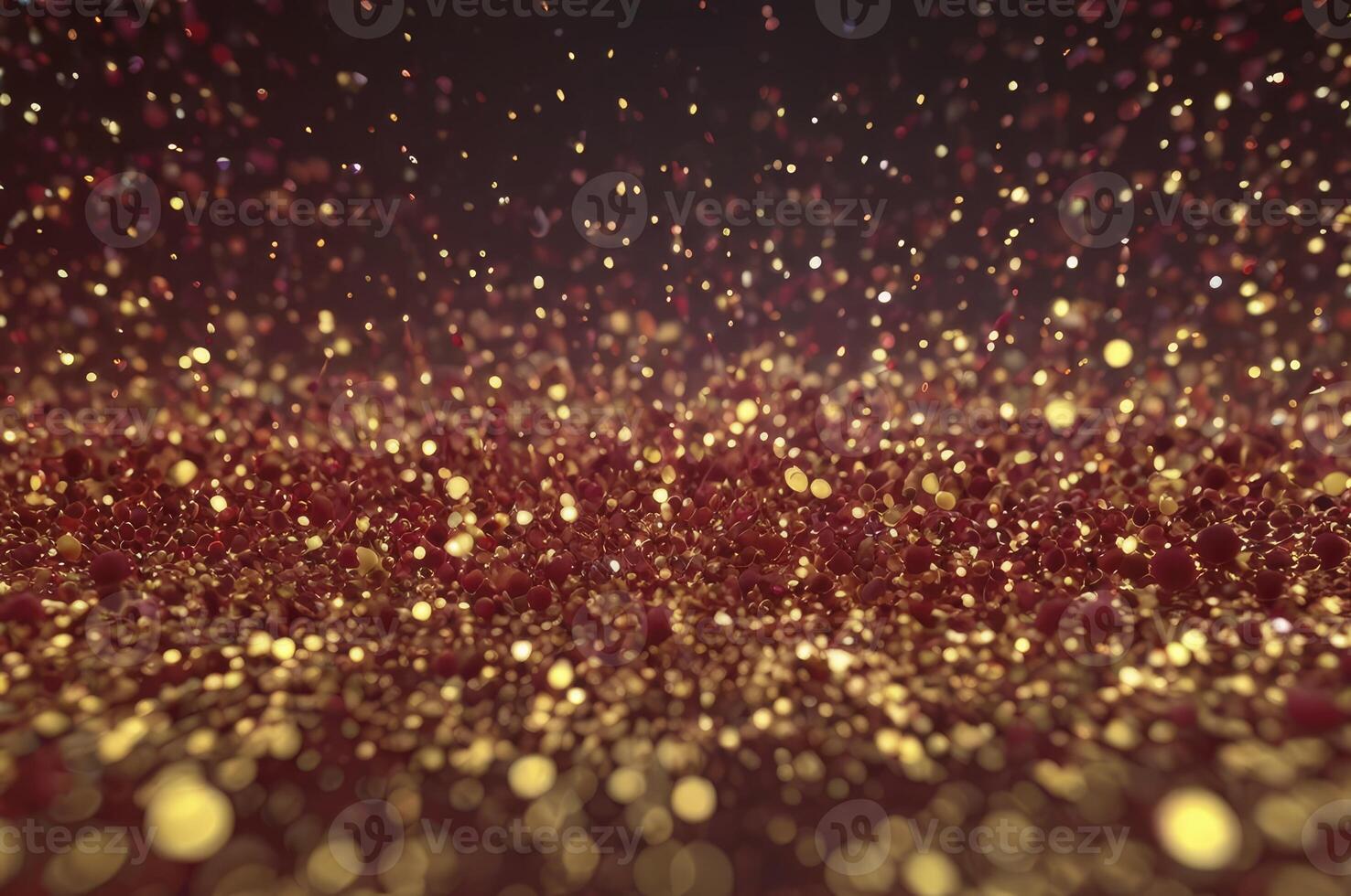 Golden Glittering Particles Falling with Dark Background Creates a Festive Mood photo