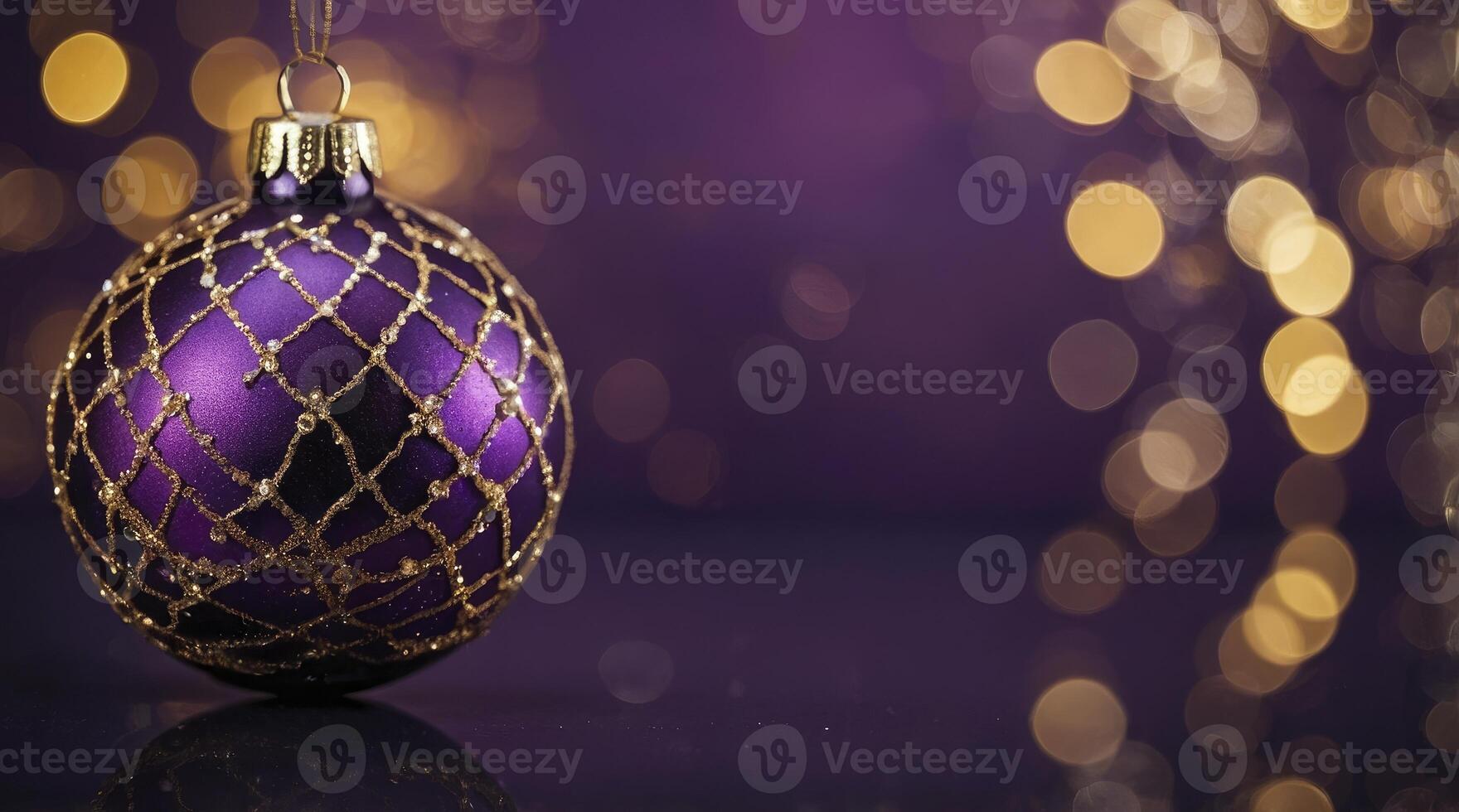 Elegant Purple Christmas Ornament with Golden Details on Festive Bokeh Background photo