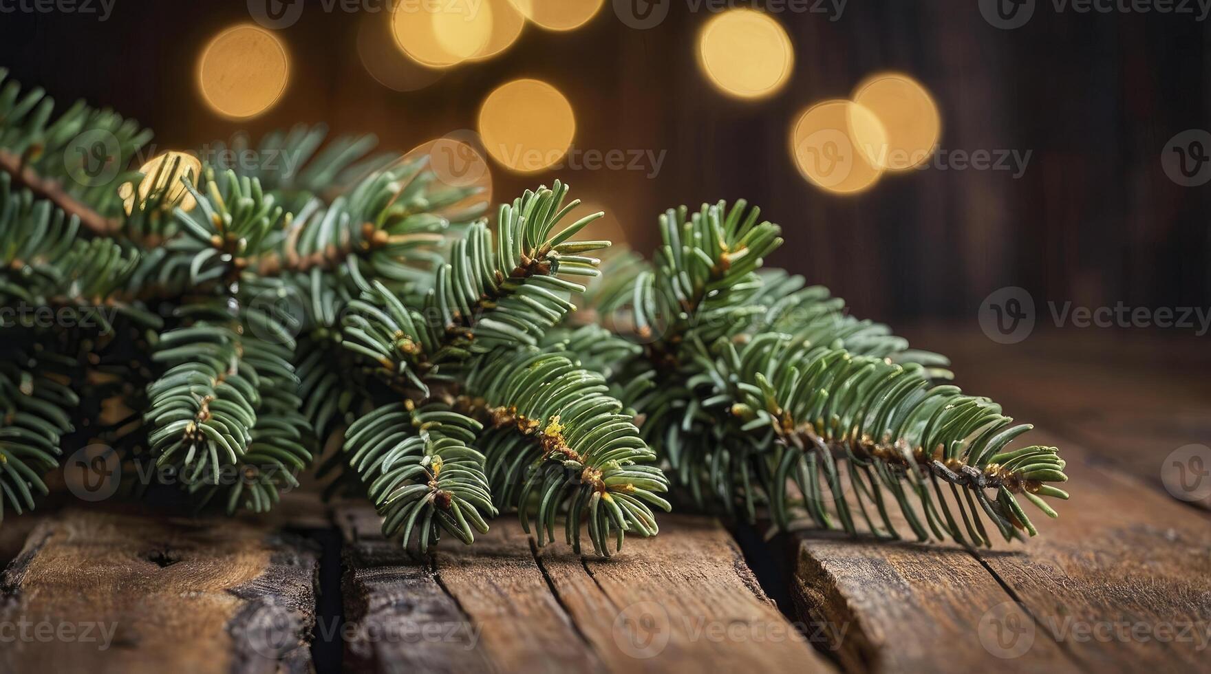 Christmas Tree Branch on Rustic Wood with Festive Bokeh Lights photo