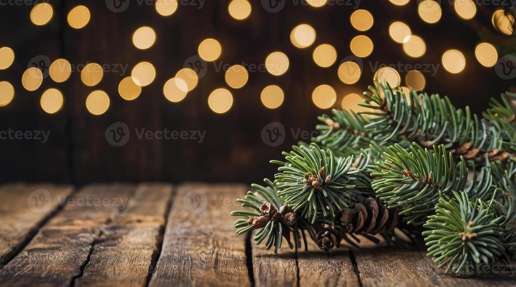 Fir Branch and Pine Cones on Rustic Wood with Bokeh Lights photo