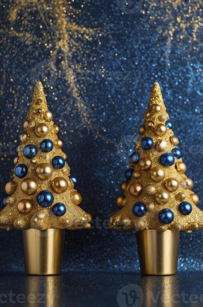 Decorative Christmas Trees with Gold Ornaments on a Sparkling Blue Background photo