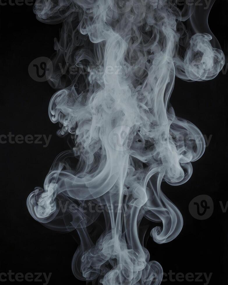 Swirling White Smoke Plumes Against Dark Background for Creative Compositions photo