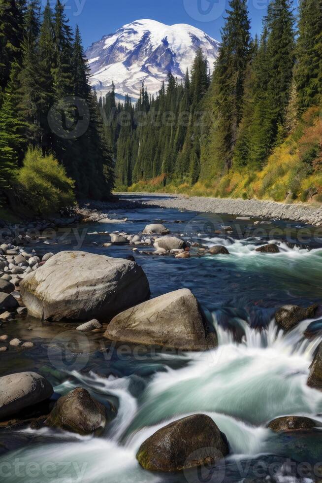Flowing River Landscape with Snowy Mountain Peak and Evergreen Trees photo