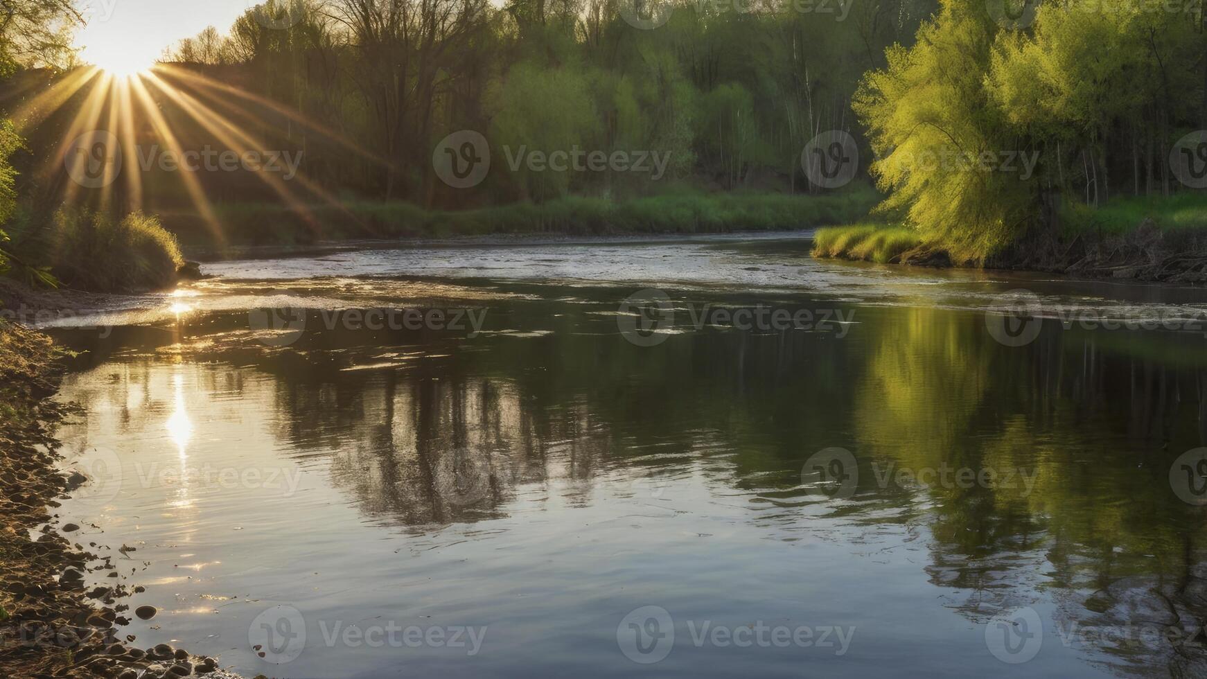 Tranquil River Scene at Sunset with Sunrays Shining Through Trees photo