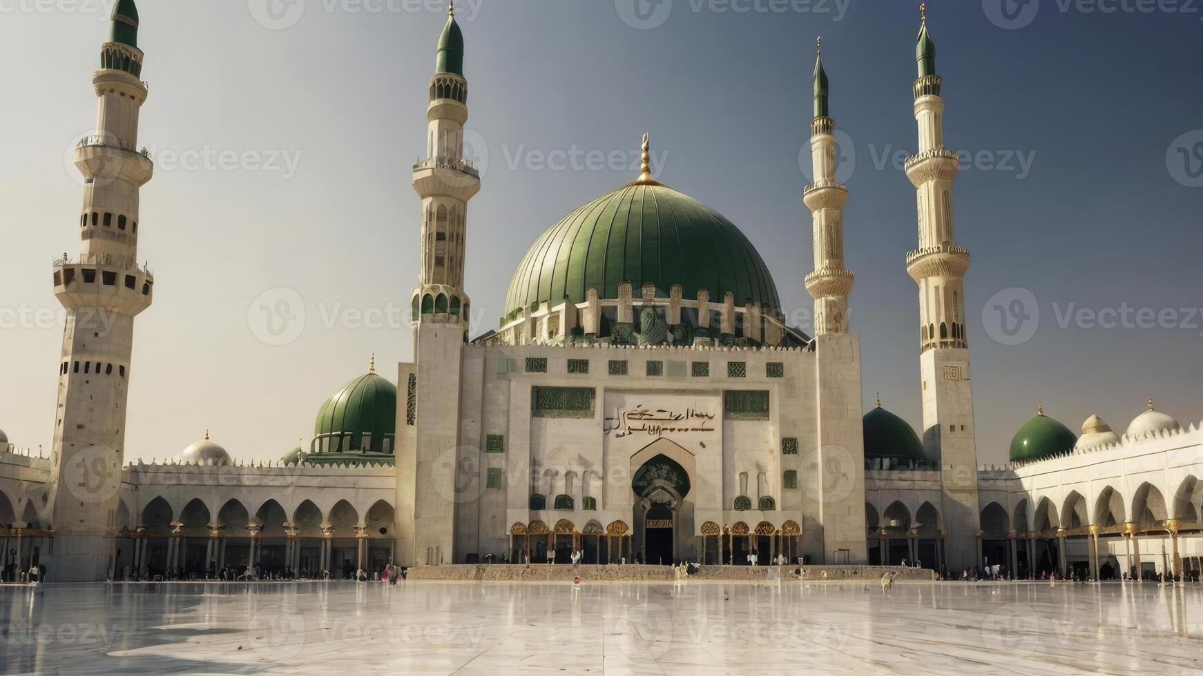 Exterior View of Masjid an Nabawi with Its Minarets and Green Domes photo