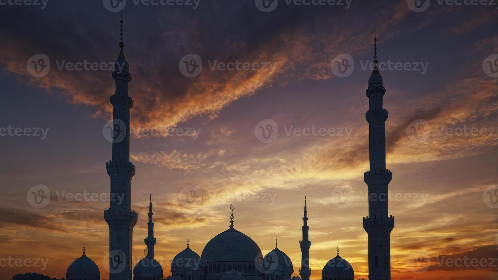 Mosque Silhouette at Sunset with Dramatic Sky in Middle East photo
