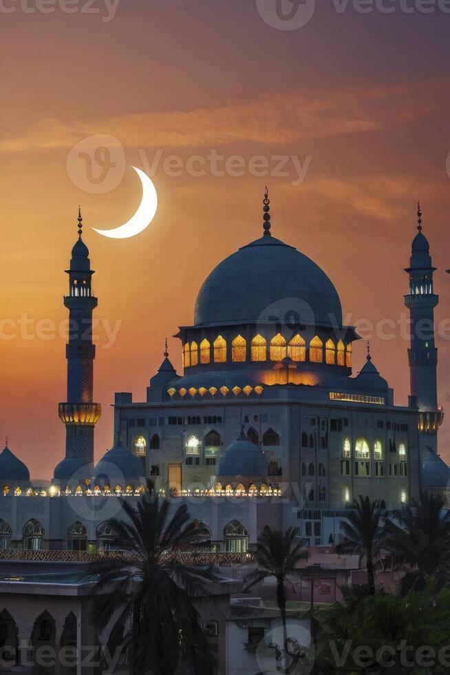Mosque Architecture at Sunset with Crescent Moon Glowing in Warm Sky photo