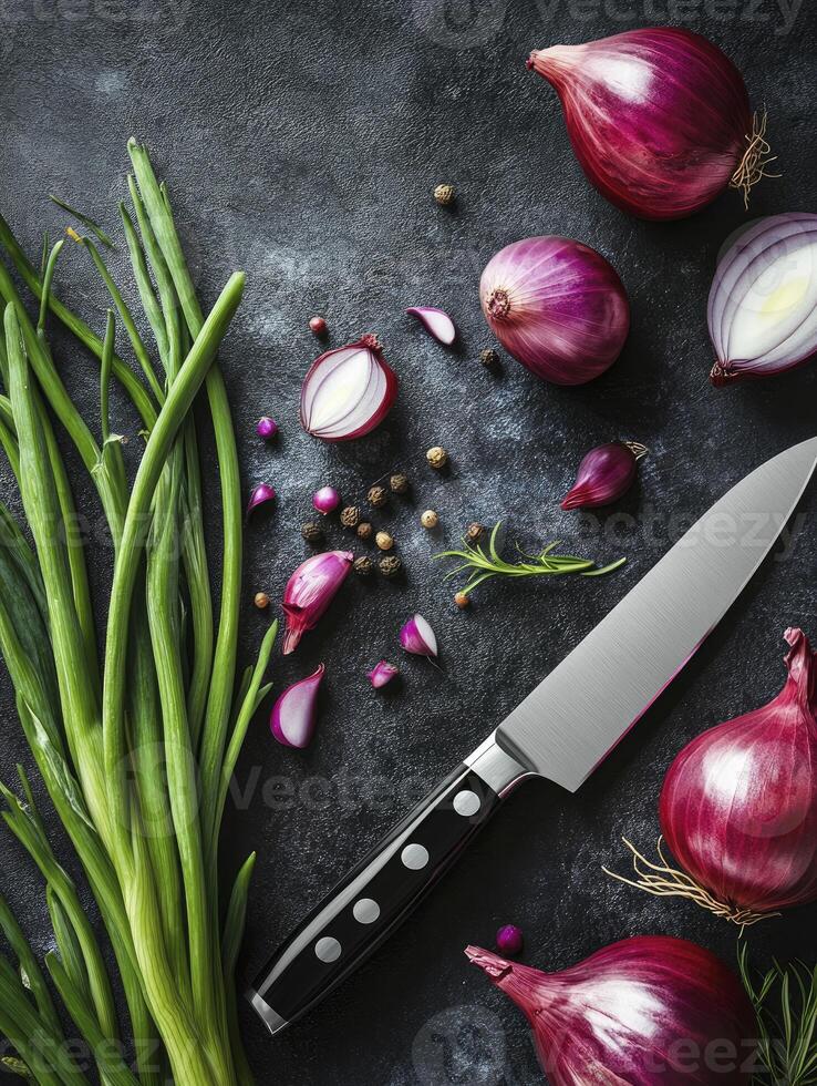 Preparing Red Onion with Fresh Herbs and Knife on Dark Surface photo