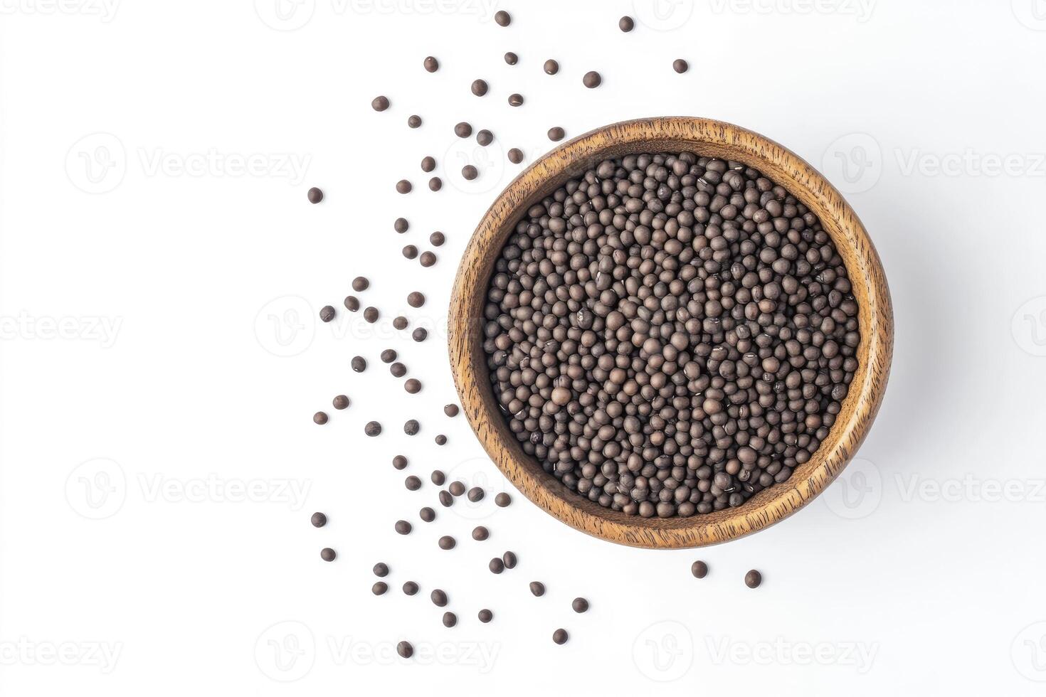 Black Mustard Seeds in Wooden Bowl on White Background Still Life photo