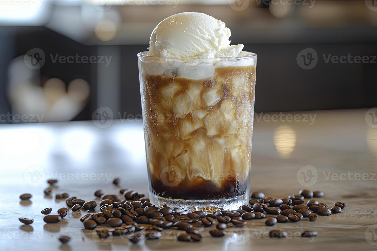 Iced Coffee with Ice Cream Scoop and Coffee Beans on Table photo