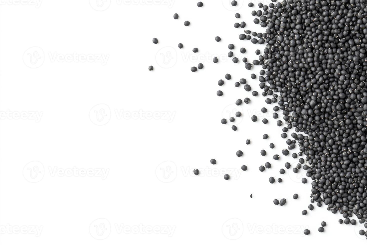 Scattered Black Bean Seeds on White Background Simple Cooking Ingredient photo