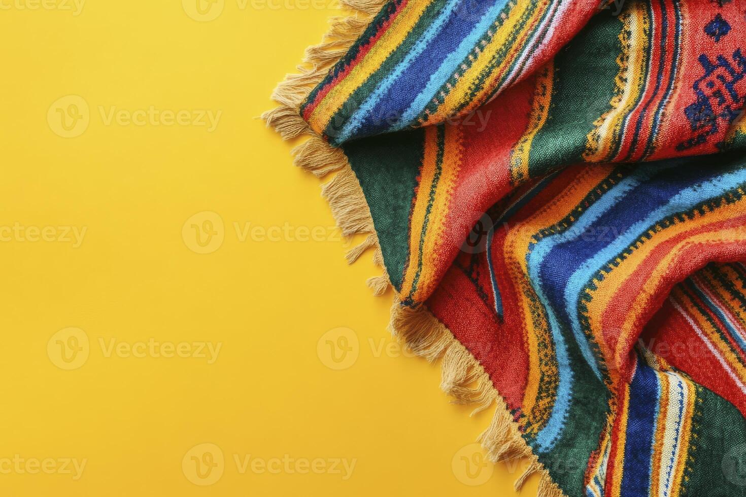 Colorful Striped Blanket on Yellow Backdrop Bright Vibrant Fabric Texture photo