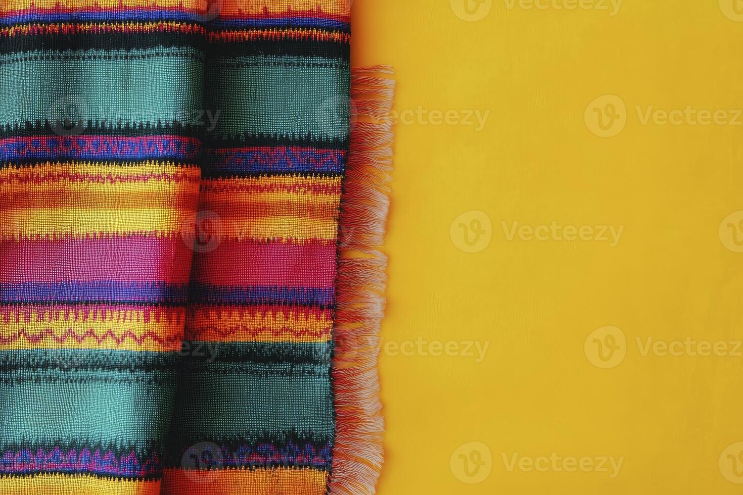 Colorful Striped Textile with Fringe on Yellow Background - Fabric Design photo