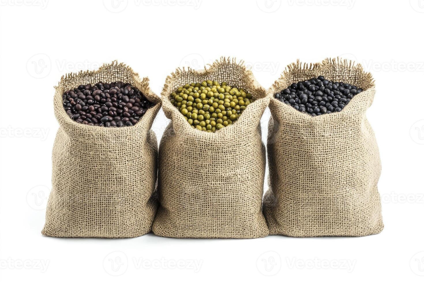 Three Bags of Assorted Beans in Burlap Sacks Isolated on White photo