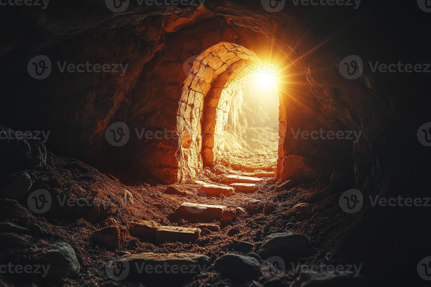 Emerging From Dark Cave Through Stone Archway Into Bright Sunlight photo