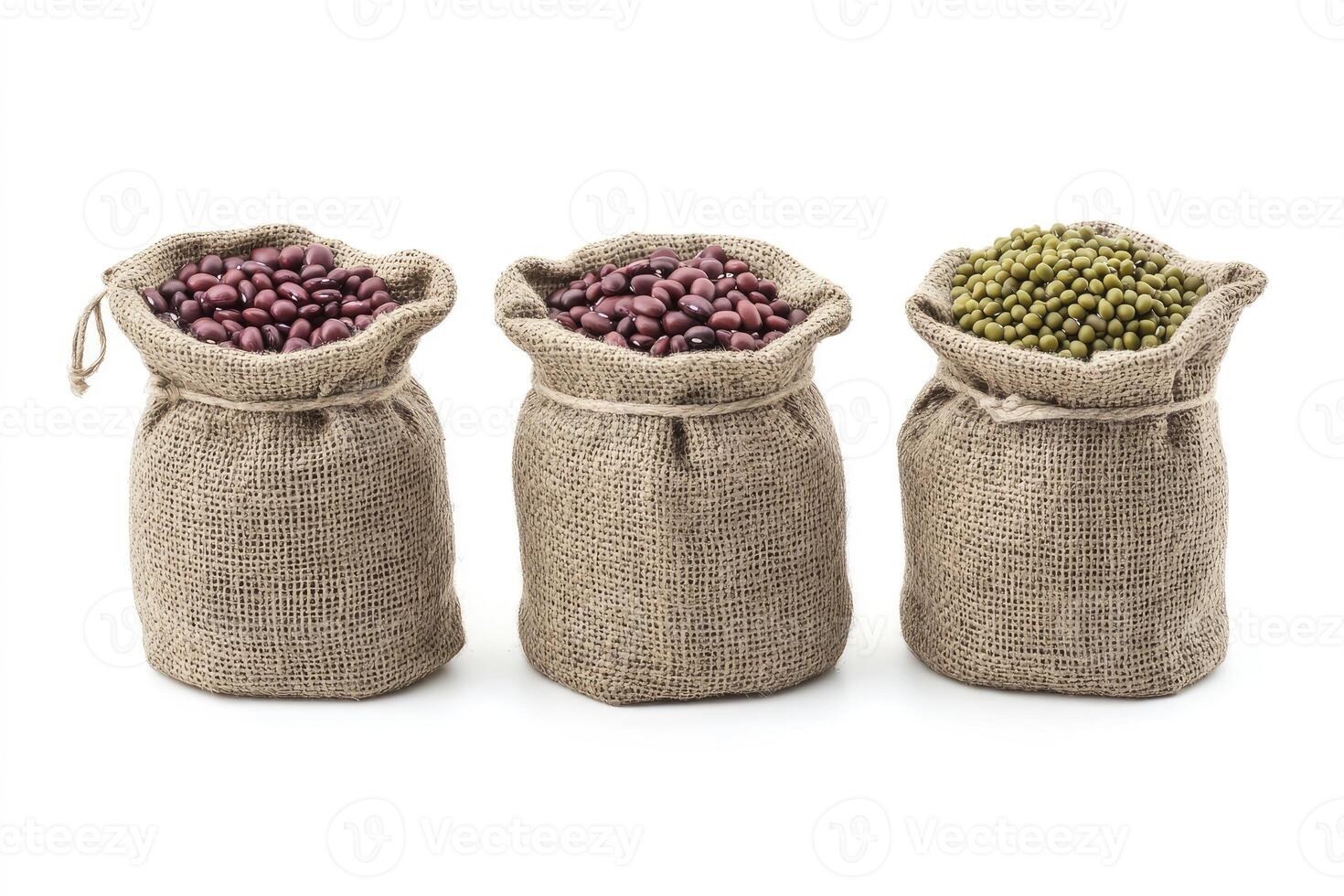 Three Burlap Sacks Filled with Different Beans on a White Background photo