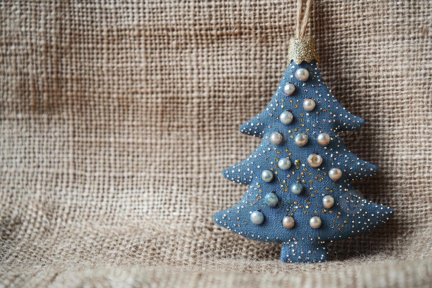 Festive Christmas Tree Ornament with Pearls and Glitter on Burlap photo