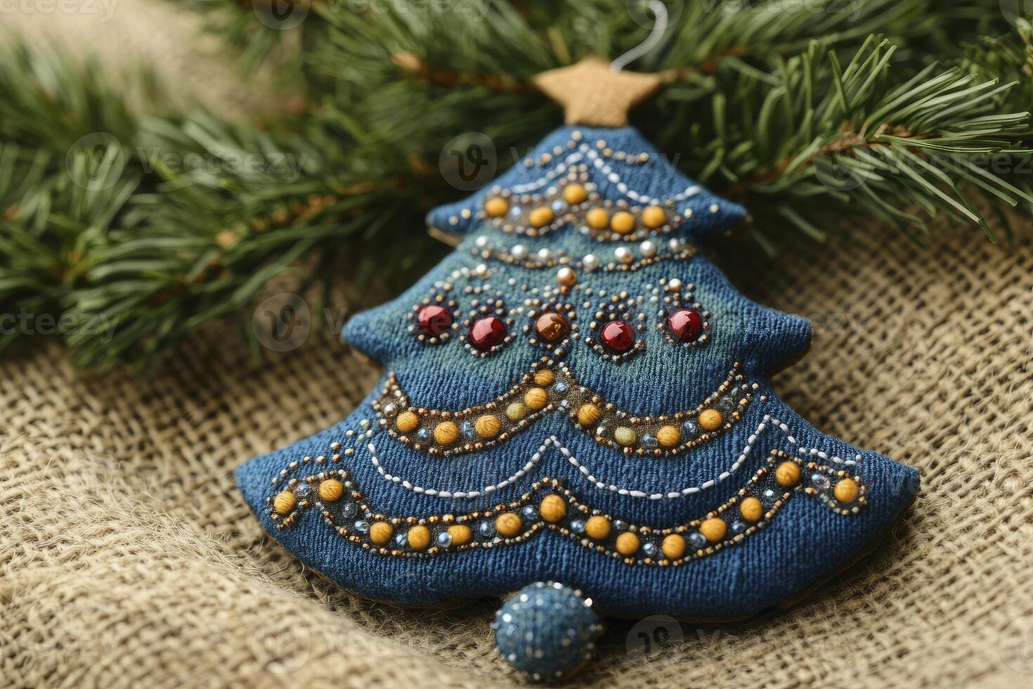 Denim Christmas Tree Ornament with Beads on Burlap and Pine Branch photo